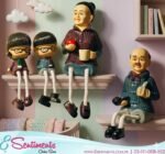 4-Piece "Family" Resin Figurine Set – Hanging Legs Shelf Decor - Image 5