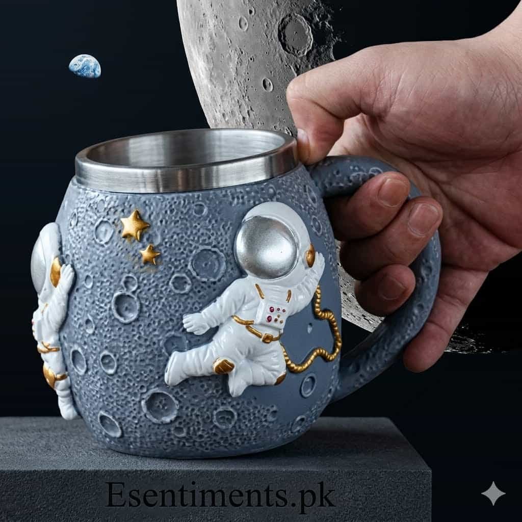 download (2) 3D Outer Space Astronaut Moon Coffee Mug – Textured Lunar Surface Ceramic Cup with Stainless Steel Liner - Image 1