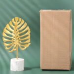 Luxury Nordic Gold Monstera Leaf Metal Tabletop Sculpture with Terrazzo Cylinder Base - Image 2
